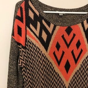 Black, tan, orange sweater